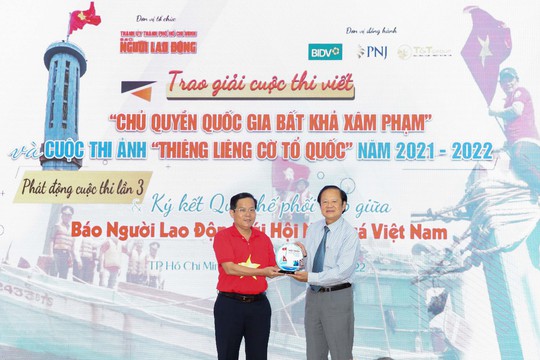 Báo Người Lao Động và Hội Nghề cá Việt Nam ký quy chế phối hợp - Ảnh 1.
