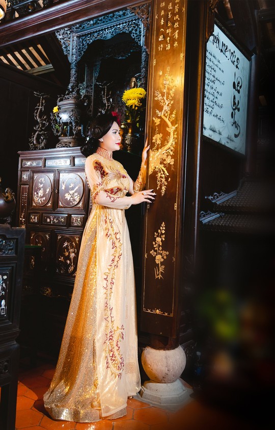 Hoa hậu Lý Kim Ngân đẹp nền nã trong tà áo dài thuần Việt - Ảnh 2.