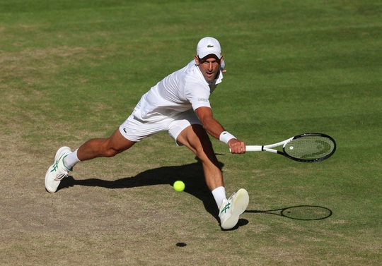 Djokovic phá kỷ lục dự chung kết Grand Slam của Federer - Ảnh 1.