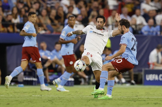 Haaland rực sáng với cú đúp, Man City đại thắng ở Sevilla - Ảnh 1.