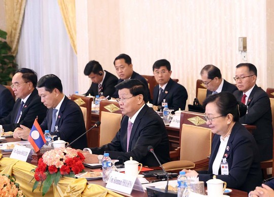 Chủ tịch nước Võ Văn Thưởng công bố món quà trị giá 1 triệu USD tặng Lào - Ảnh 3.