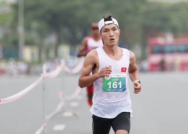 Nguyên Thanh, Ngọc Hoa phá kỷ lục quốc gia tại Giải Vô địch marathon châu Á- Ảnh 1.