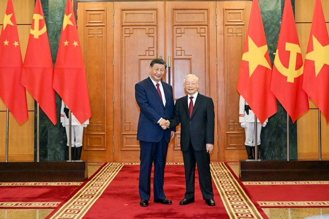 Tổng Bí thư Nguyễn Phú Trọng và Tổng Bí thư, Chủ tịch nước Trung Quốc Tập Cận Bình chụp ảnh chungẢnh:   TTXVN