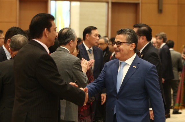 Thủ tướng Phạm Minh Chính và Phu nhân gặp mặt Đoàn Ngoại giao nhân Tết cổ truyền- Ảnh 7.