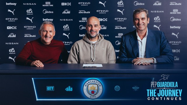 HLV Pep Guardiola chính thức ký gia hạn hợp đồng 2 năm với Man City- Ảnh 1.