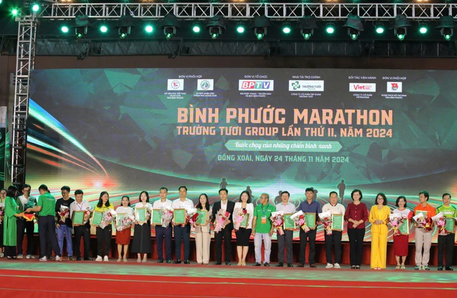 Hoàng Nguyên Thanh lần thứ nhì vô địch Giải Marathon Bình Phước - Ảnh 1.