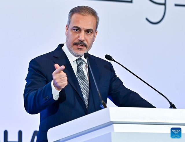 Turkish Foreign Minister Hakan Fidan speaks at a press conference during the Doha Forum 2024 in Qatar, Dec. 8, 2024. Turkish Foreign Minister Hakan Fidan stressed here on Sunday the need to prevent terrorist organizations from exploiting the situation in Syria for their own agendas. (Photo by Nikku/Xinhua)