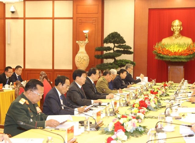 Tổng Bí thư Nguyễn Phú Trọng đồng chủ trì cuộc gặp cấp cao Việt - Lào- Ảnh 6.