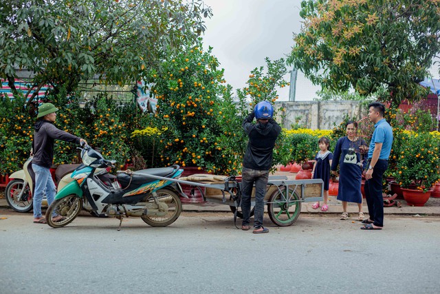 Khung cảnh nhộn nhịp ở chợ hoa Ba Đồn ngày giáp Tết- Ảnh 11.