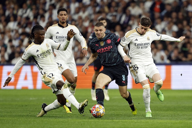 Real Madrid hòa nghẹt thở Man City trong trận đấu 6 bàn thắng- Ảnh 1.
