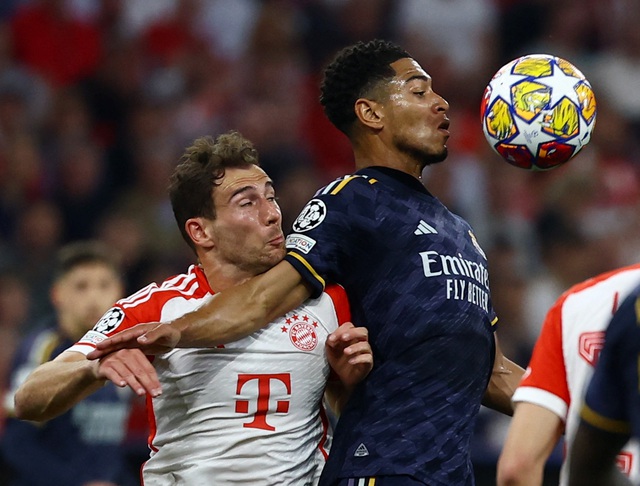 Leon Goretzka in action with Real Madrid's Jude Bellingham