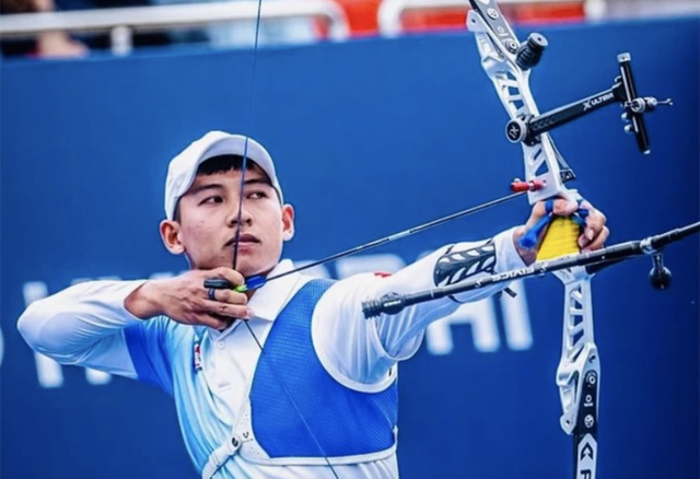 Cung thủ Lê Quốc Phong giành suất Olympic thứ 12 cho thể thao Việt Nam- Ảnh 1.