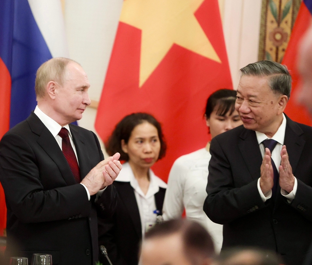 Chủ tịch nước Tô Lâm chủ trì tiệc chiêu đãi Tổng thống Vladimir Putin- Ảnh 1.