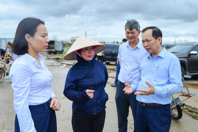 Ngân hàng khẩn trương cơ cấu lại nợ, miễn giảm lãi vay cho khách hàng bị ảnh hưởng bão số 3- Ảnh 1.