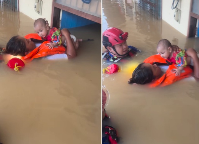 Lũ lịch sử ở Thái Lan: Người dân trèo cáp, phá mái nhà thoát hiểm - Ảnh 5. Lũ lịch sử ở Thái Lan: Người dân trèo cáp, phá mái nhà thoát hiểm - Ảnh 5.