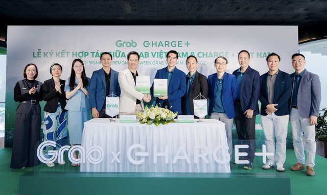 Grab Việt Nam và Charge+ hợp tác phát triển mạng lưới trạm sạc xe điện - Ảnh 1.