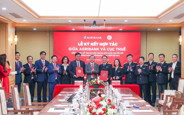 Agribank cùng Cục Thuế hỗ trợ hộ kinh doanh chuyển đổi sang thuế kê khai - Ảnh 1.