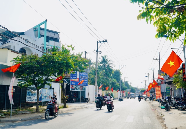 Báo Người Lao Động trao tặng cờ Tổ quốc cho phường Tam Bình, TP Thủ Đức- Ảnh 6.