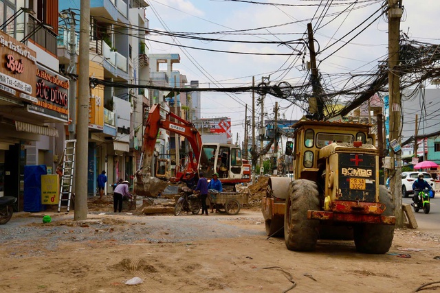 Cận cảnh giải phóng mặt bằng, người dân trông ngày metro số 2 lăn bánh- Ảnh 1.