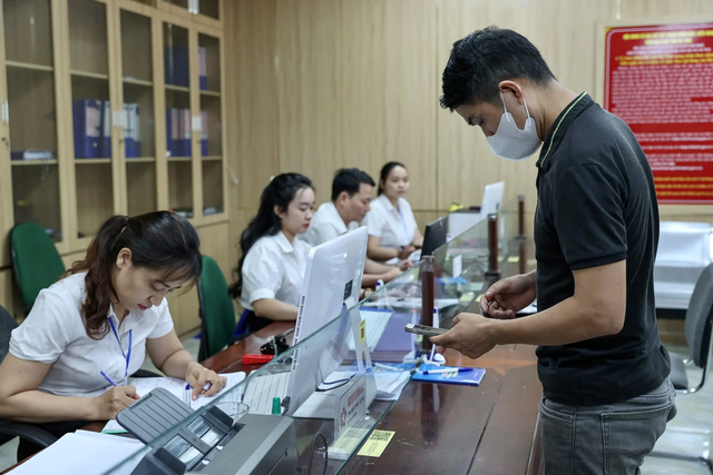 Sau sáp nhập xã, những chức danh nào không còn? - Ảnh 1.