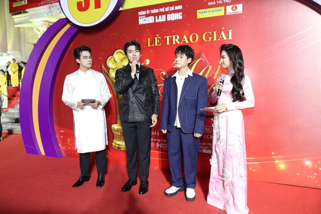 Thảm đỏ Mai V&agrave;ng lần thứ 31: Đo&agrave;n l&agrave;m phim "Mưa đỏ" đến sớm - Ảnh 4.