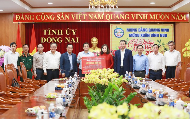 TPHCM hỗ trợ tết 500 triệu Đồng cho tỉnh Đồng Nai chăm lo người nghèo - Ảnh 1.