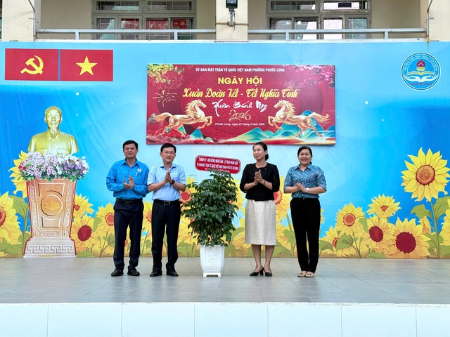 Ấm &aacute;p Ng&agrave;y hội &ldquo;Xu&acirc;n đo&agrave;n kết - Tết nghĩa t&igrave;nh&rdquo; tại phường Phước Long TPHCM - Ảnh 4.