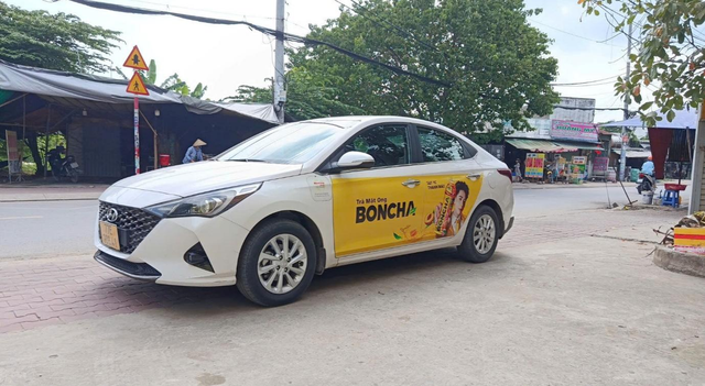 VNP MEDIA triển khai dịch vụ dán quảng cáo trên taxi công nghệ - Ảnh 2.