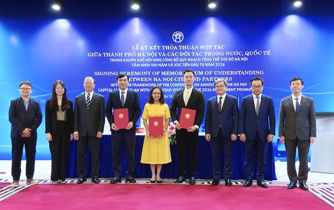 Hà Nội và Grab Việt Nam hợp tác phát triển đô thị thông minh, chuyển đổi số - Ảnh 1.