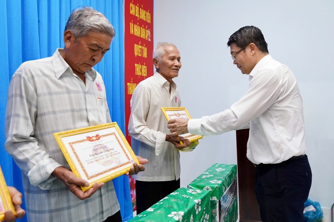 Xây dựng xã Bình Chánh, TP HCM phát triển từ sức mạnh đoàn kết - Ảnh 4.