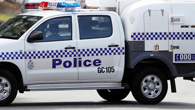 Cảnh sát Úc đang kiểm tra khu vực Bộ Ngoại giao và Thương mại (DFAT) ở thủ đô Canberra. Ảnh: Perth Now