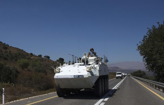 Xe bọc thép chở nhân viên UNDOF ở cao nguyên Golan hôm 28-8. Ảnh: Reuters