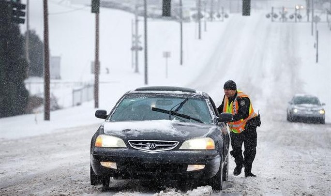 Snow is a four-letter word: Northeast hit with another storm; South still reeling from ice