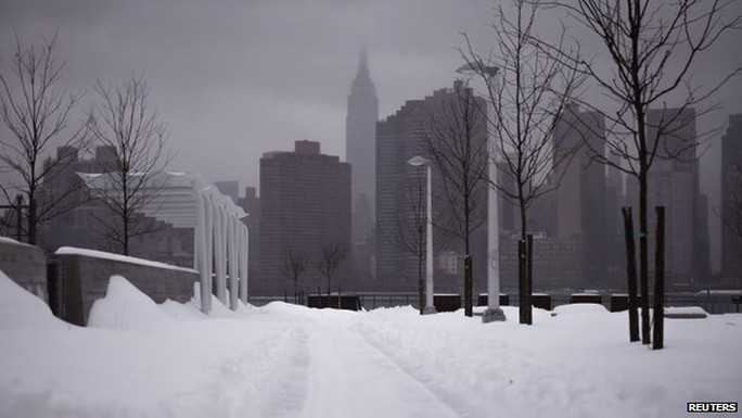 The Empire State Building seen from a snowy path in Queens, New York 13 February 2014