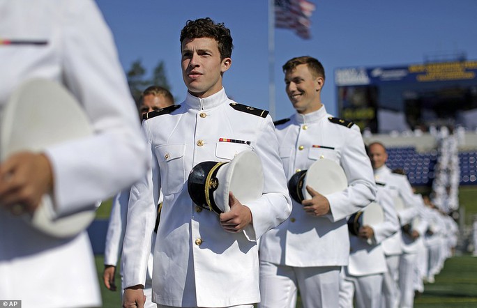 Ceremonious: Graduating members of the U.S. Naval Academy march into the ceremony on Friday morning