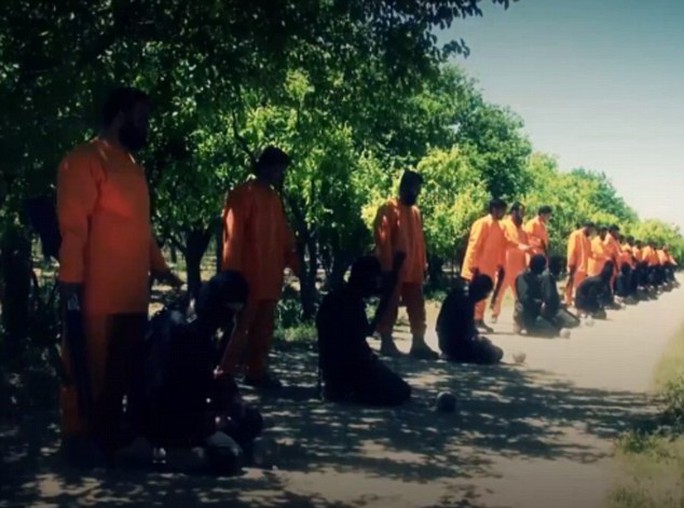 Phiến quân Hồi giáo Jaysh al-Islam hành quyết 18 tay súng IS. Ảnh: DAILY MAIL