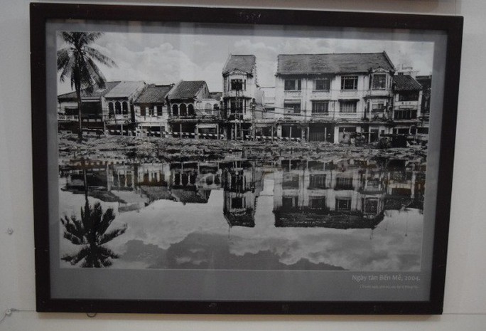 Nhiếp ảnh gia Tam Thái triển lãm ảnh Sài Gòn sau sự cố - Ảnh 1.