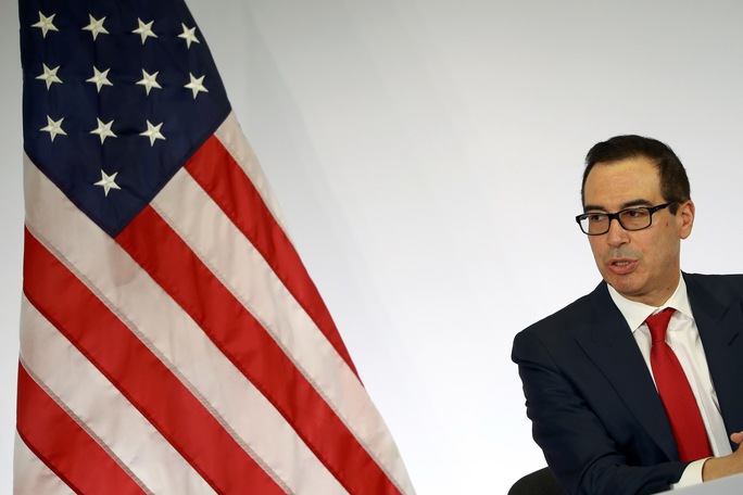 
Bộ trưởng Tài chính Mỹ Steven Mnuchin phát biểu tại cuộc họp báo trong khuôn khổ hội nghị ở Baden-Baden hôm 18-3. Ảnh: Reuters

