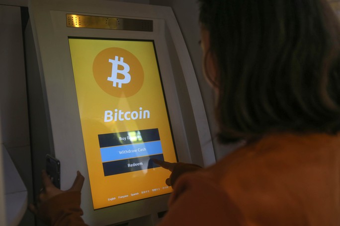 Thanh toán bằng bitcoin dù bị cấm - Ảnh 1.