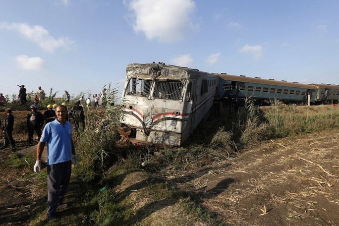 Ai Cập: Tàu hỏa đâm nhau, hơn 100 người thương vong - Ảnh 5.