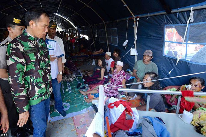 Thảm họa sóng thần Indonesia: Lần tìm người thân trong túi đựng thi thể - Ảnh 10.