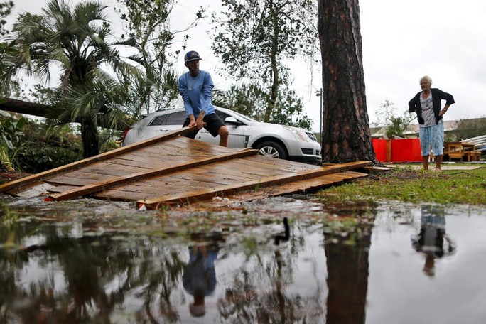 Mỹ: Cận cảnh “bão khủng khiếp nhất 100 năm” càn quét bang Florida - Ảnh 8.