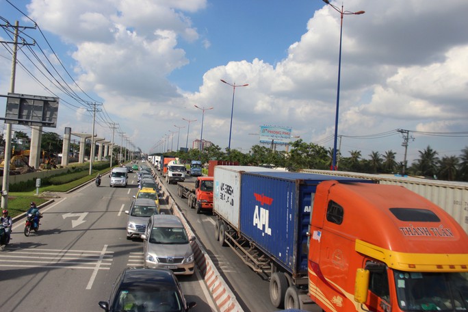 Giảm tốc độ xe: Cần linh hoạt - Ảnh 1.