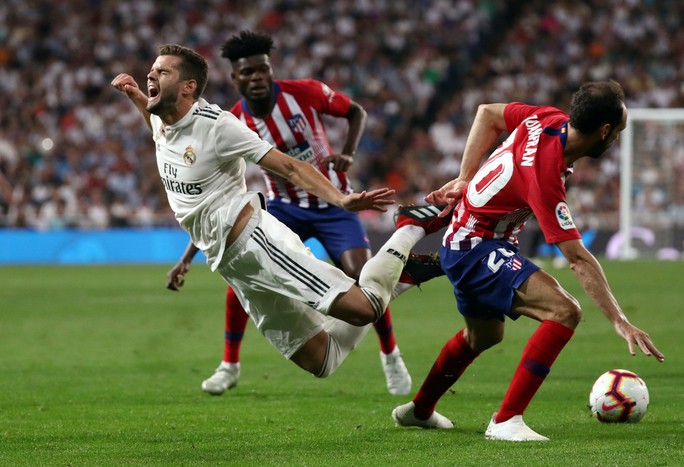 Người nhện Courtois toả sáng, Real Madrid thoát hiểm trận derby - Ảnh 4.