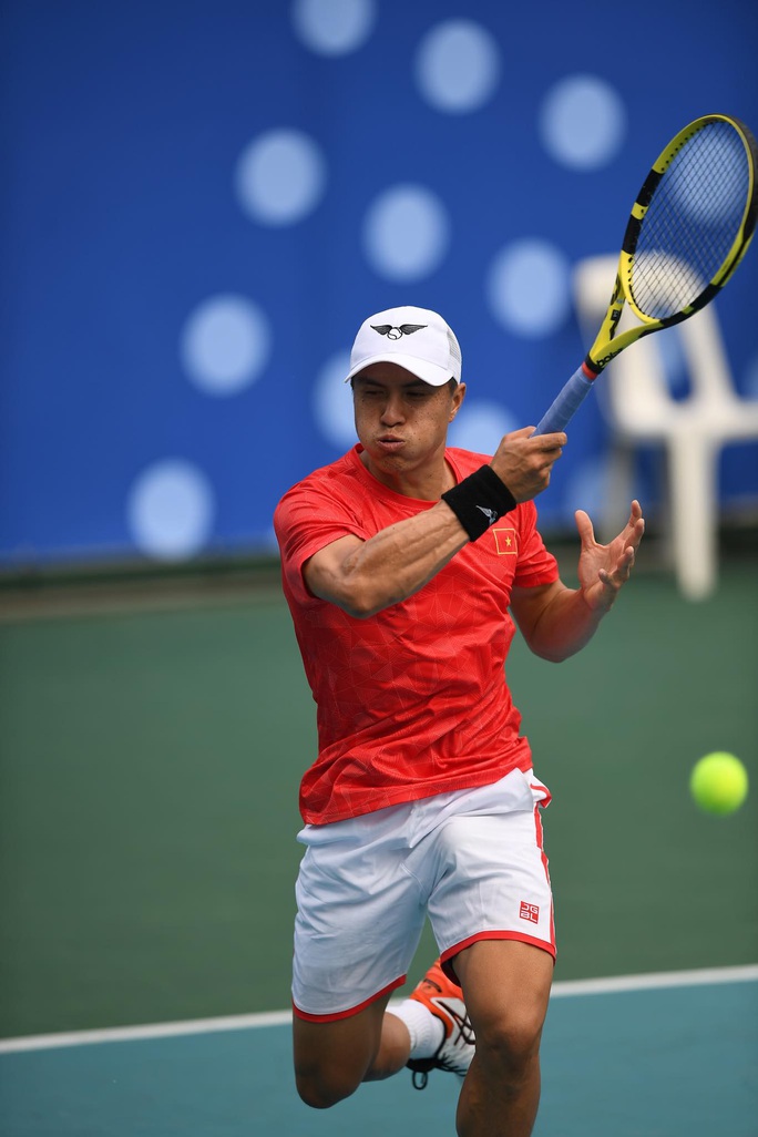 Lý Hoàng Nam, Daniel Nguyễn vào bán kết quần vợt SEA Games 30 - Ảnh 1.