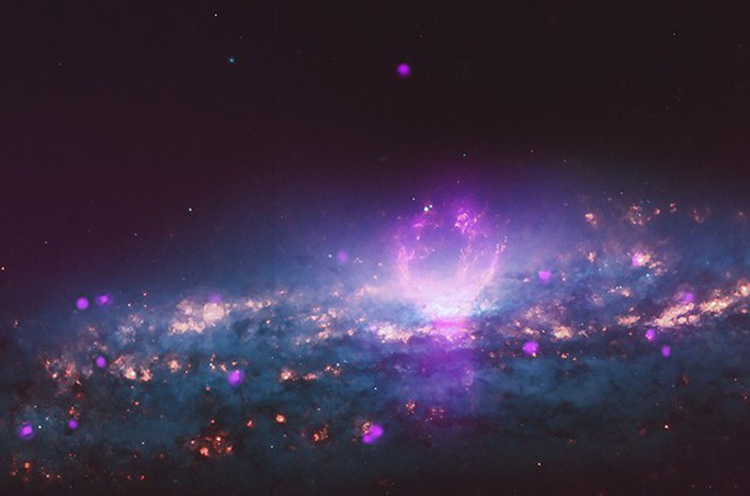 Thiên hà chứa bong bóng khổng lồ bắn tia vũ trụ vào trái đất - Ảnh 1.