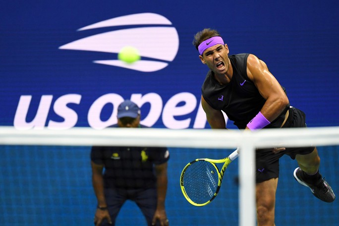 Nadal nhắn nhủ Federer, Djokovic bằng chiến thắng nhẹ ngày ra quân - Ảnh 3.