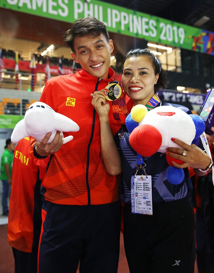 Người múa quạt Trần Nhật Hoàng và hat-trick vàng SEA Games 30 - Ảnh 4.