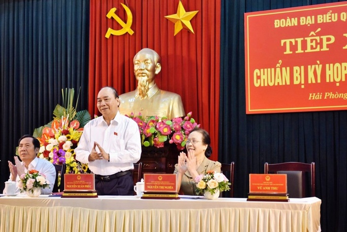 Thủ tướng trả lời cử tri về vấn đề SGK Tiếng Việt, thu hồi tài sản tham nhũng, mua sắm trang thiết bị y tế - Ảnh 2.