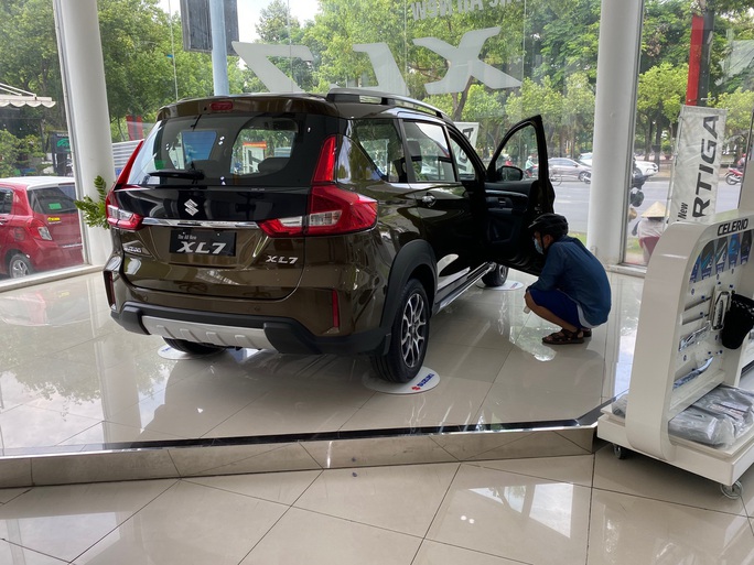 Nhiều người dùng phản ánh ôtô Suzuki XL7, Ertiga bị thấm dầu, hụt hơi - Ảnh 1.